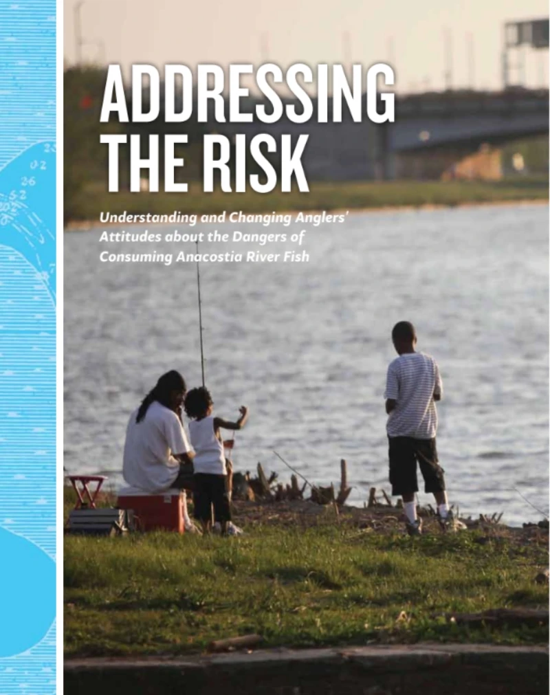 Family fishing along a riverbank with the report title "Addressing the Risk" shown on the cover